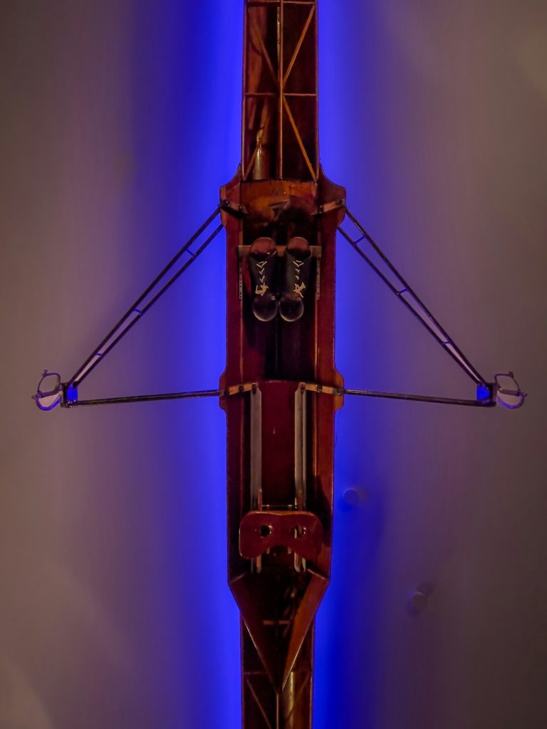 close-up-of-an-antique-wooden-rowing-machine-x2w5btvythk